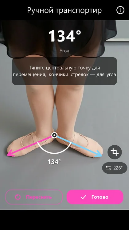Manual protractor measuring an angle on a photo